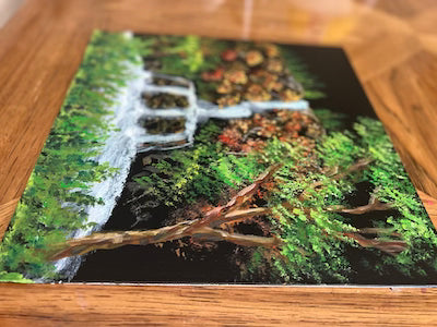 tree and waterfall on a black canvas